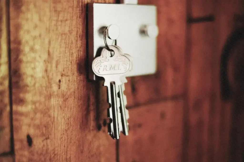 Key in the lock of a timber door – testing a new door lock after you replace it, how to replace a door lock in Farnborough with Wilds Locksmiths Farnborough